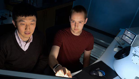 Two researchers in a lab